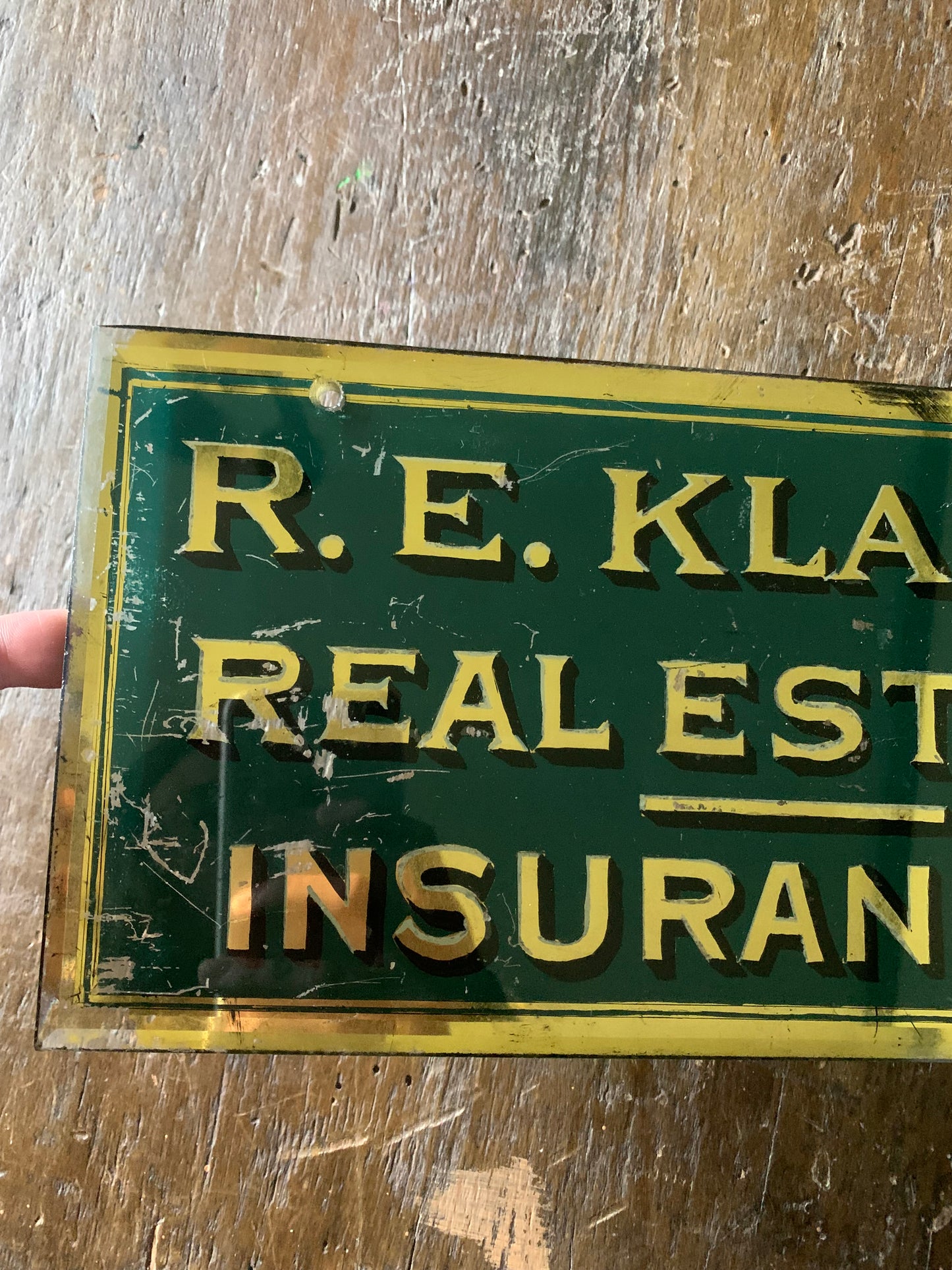Antique painted glass trade sign| green & gilt