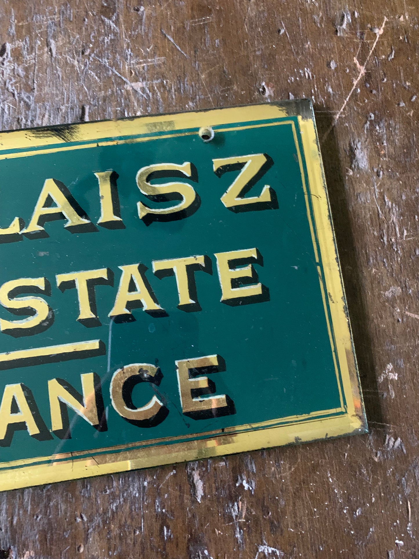 Antique painted glass trade sign| green & gilt