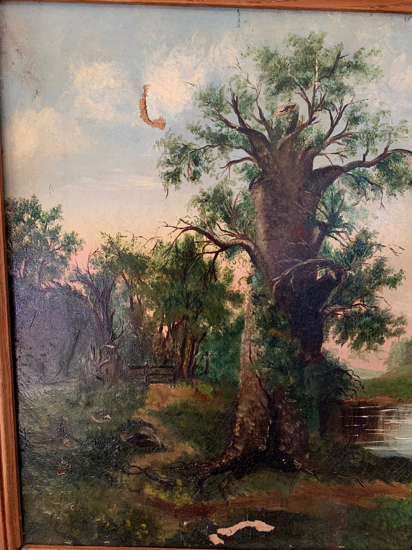 Large antique landscape painting on canvas in frame