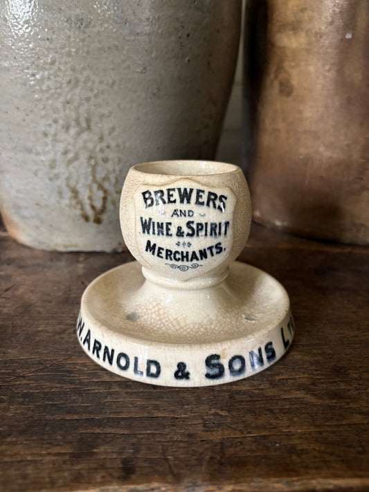 Antique advertising match strike and holder