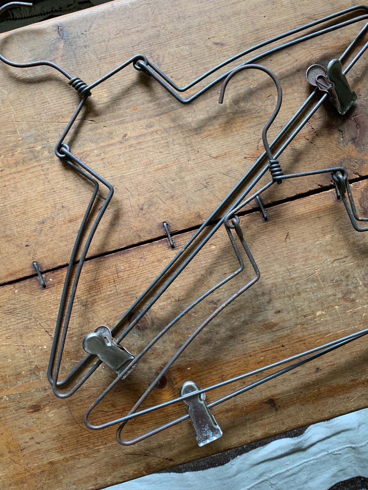 Vintage metal hanger set of 2