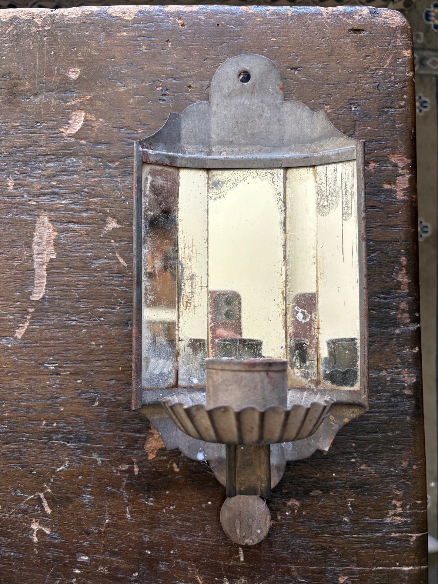 Antique mirrored candle sconce