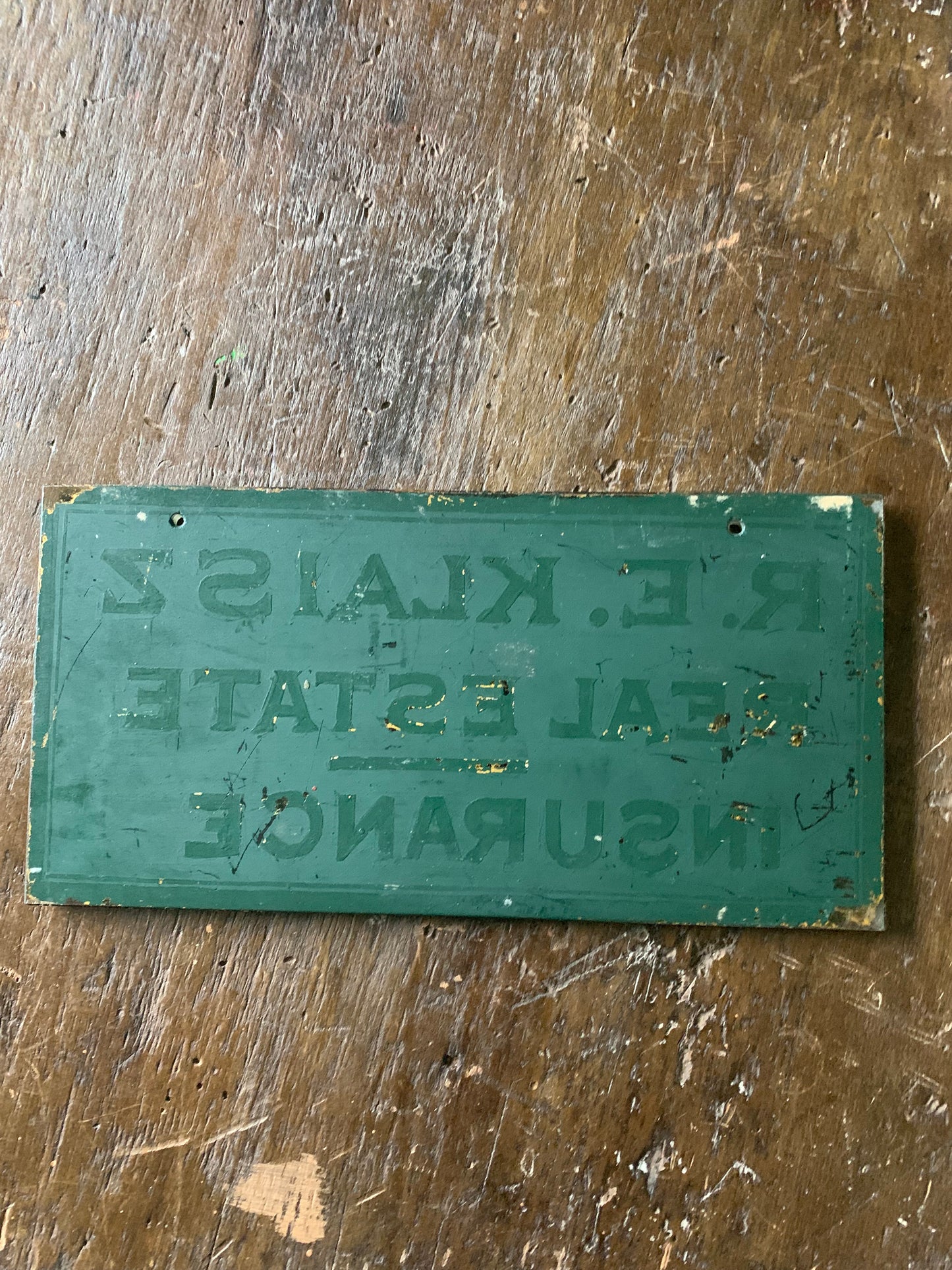 Antique painted glass trade sign| green & gilt