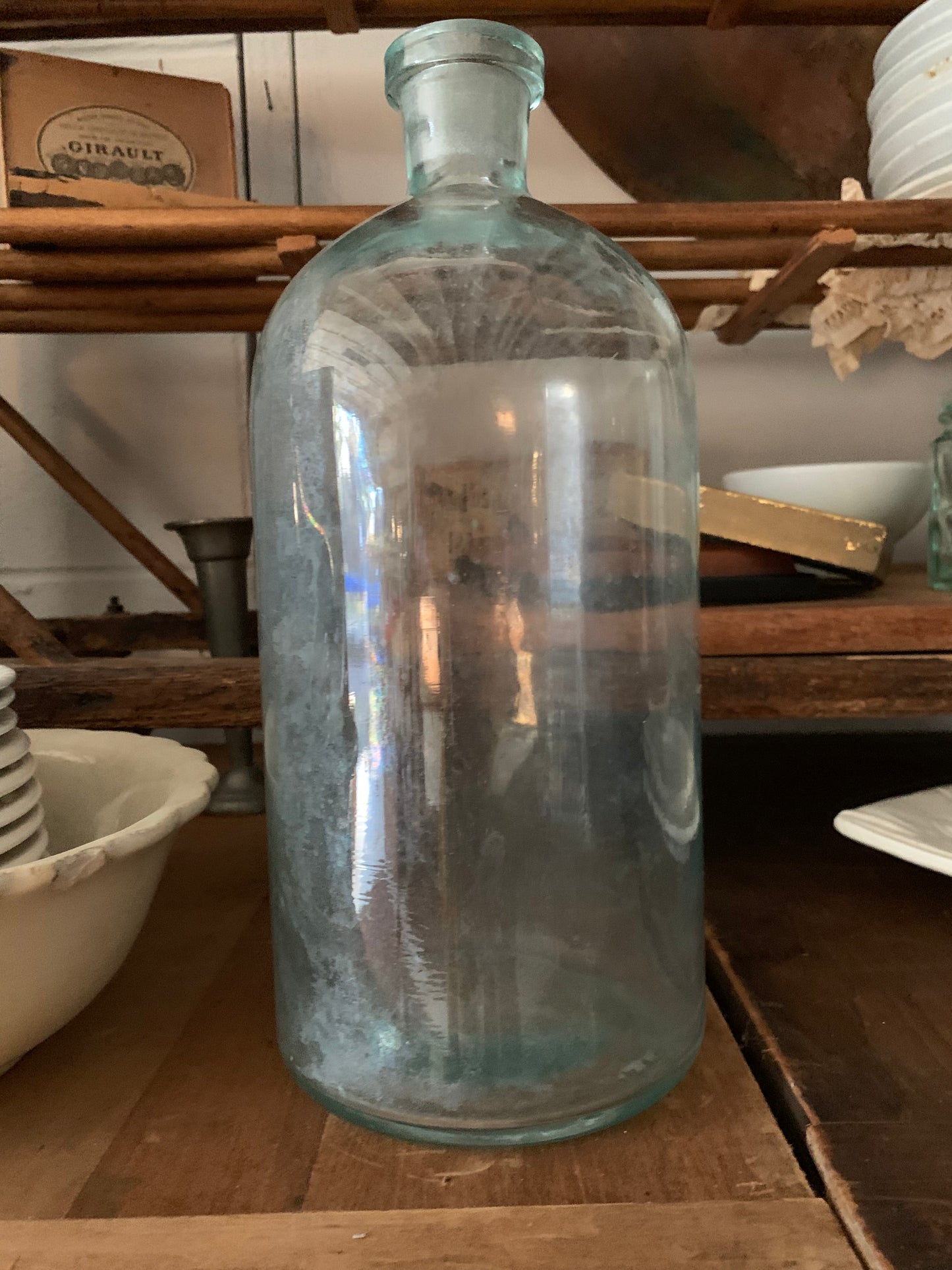 Antique large aqua bottle