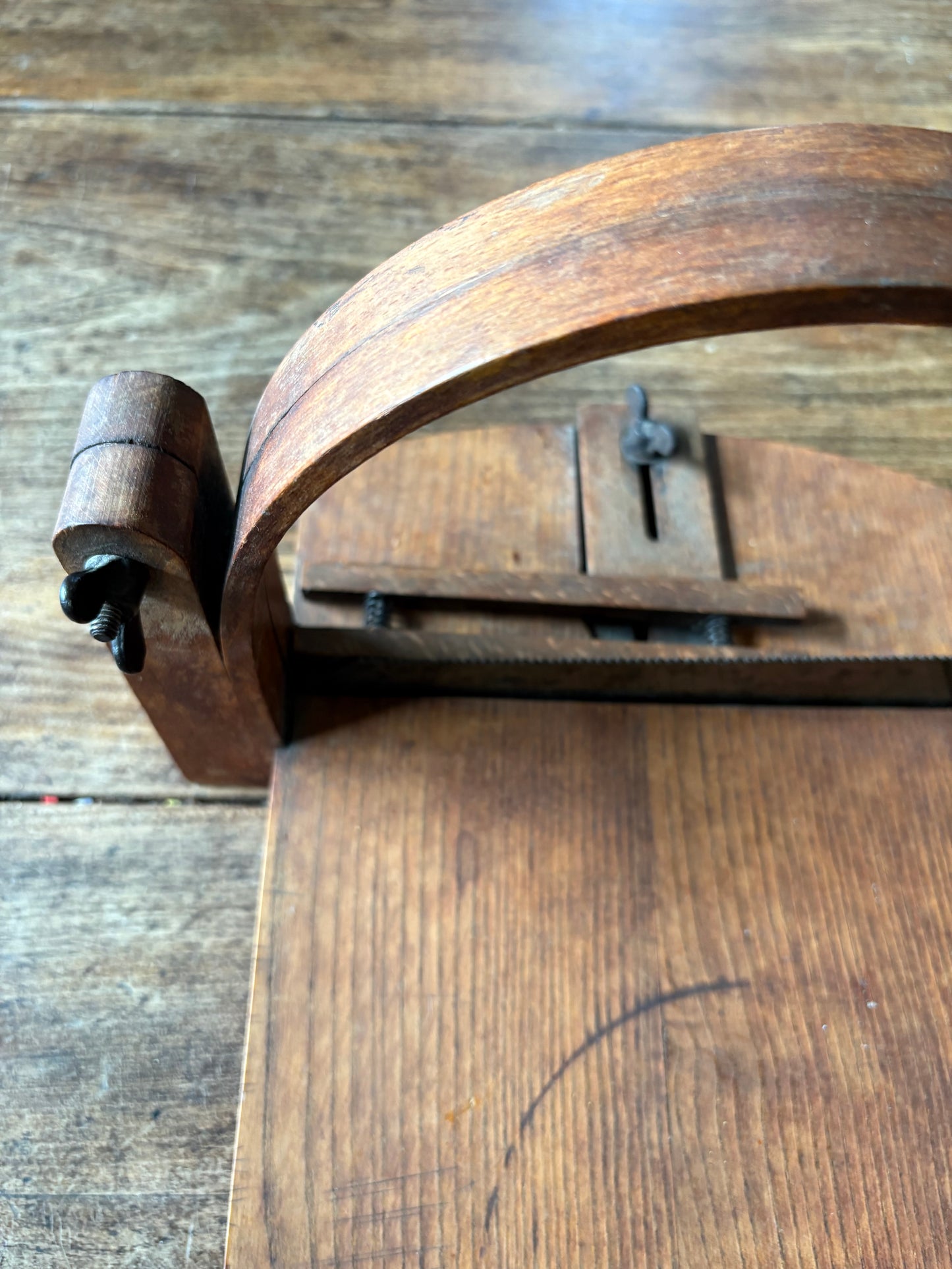 Antique wooden bread slicer with bread knife
