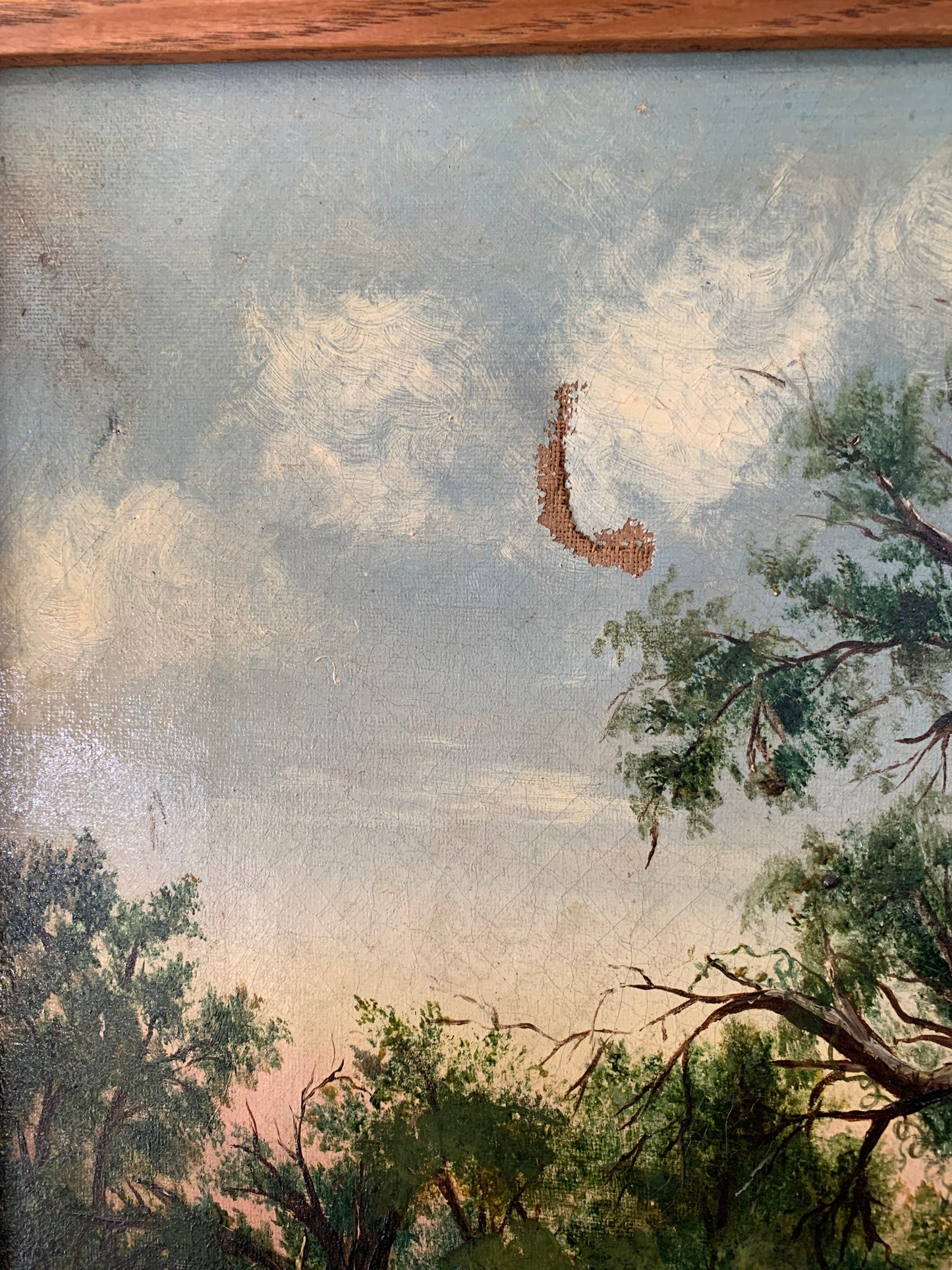 Large antique landscape painting on canvas in frame