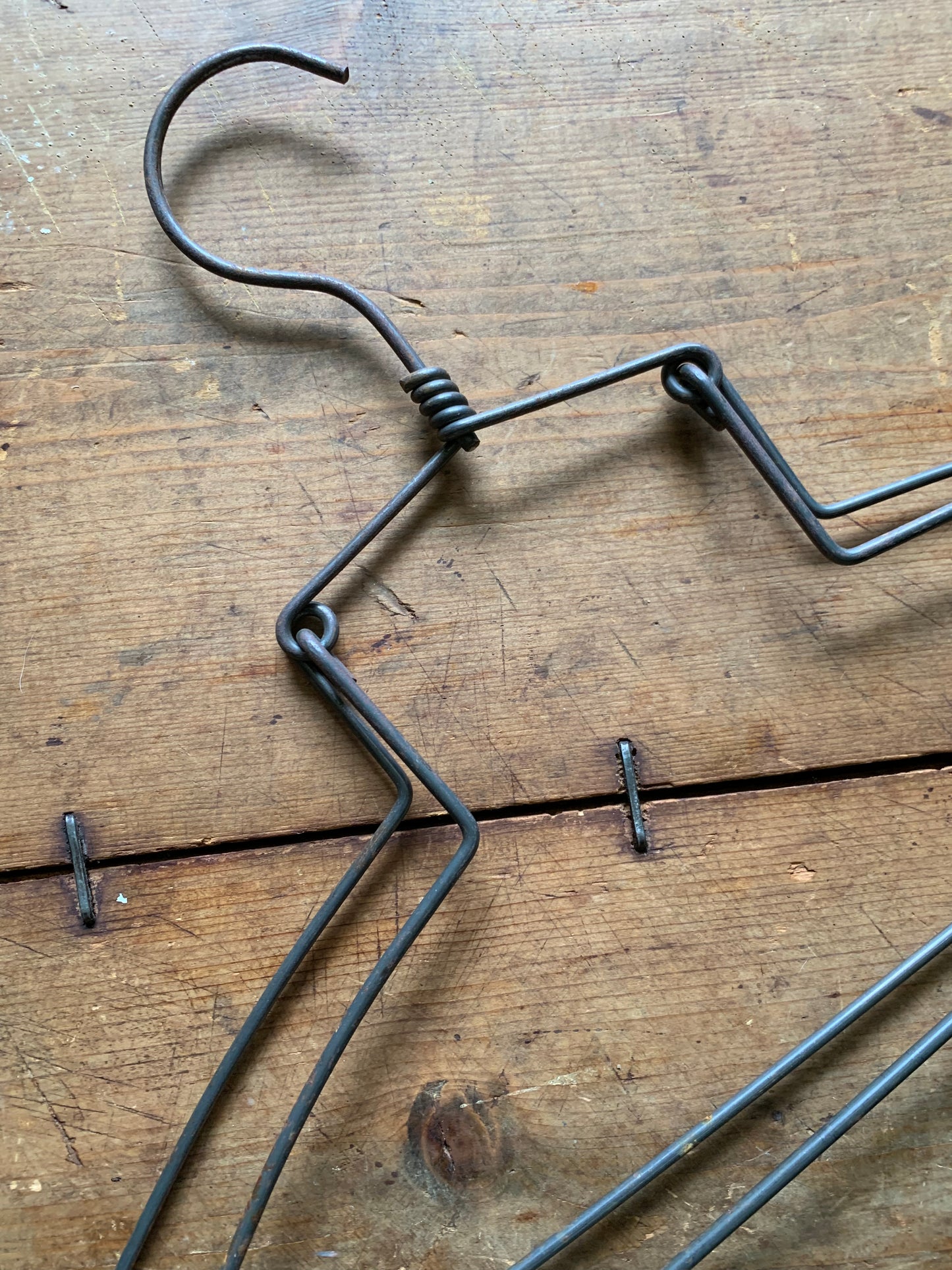 Vintage metal hanger set of 2