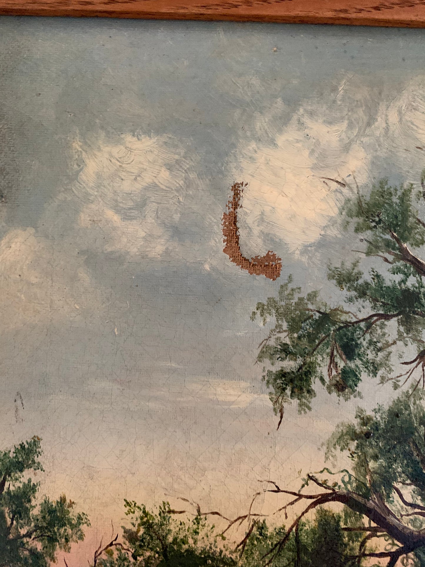 Large antique landscape painting on canvas in frame