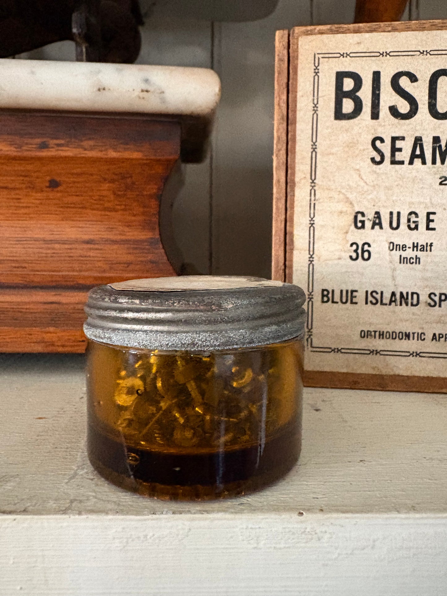 Antique small amber watch maker jar