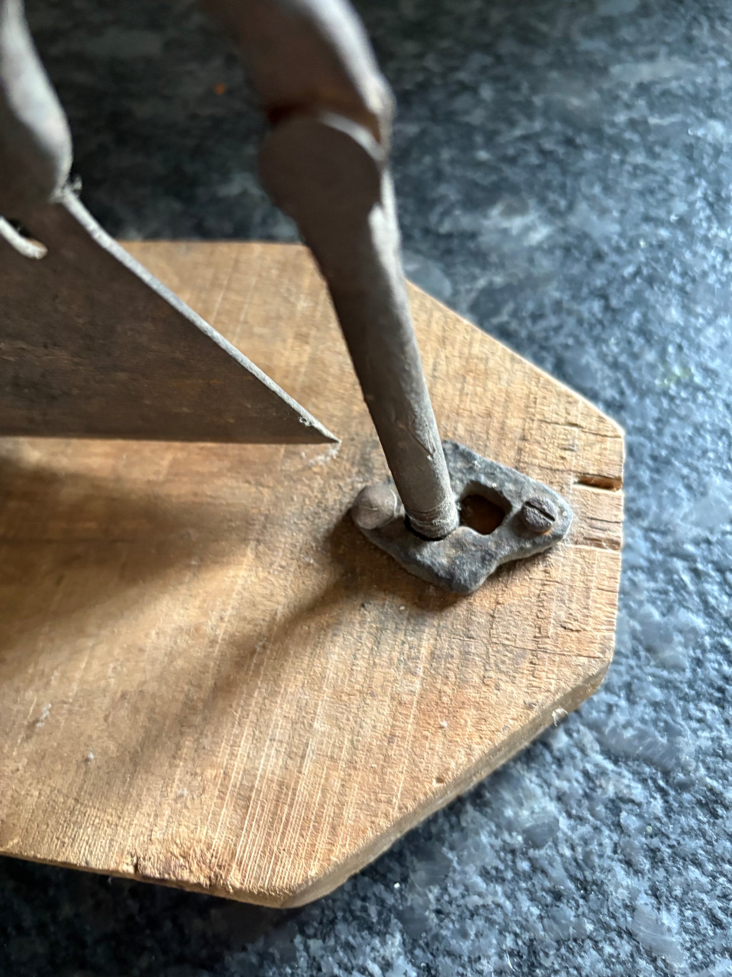 Antique iron & wood herb chopper on cutting board