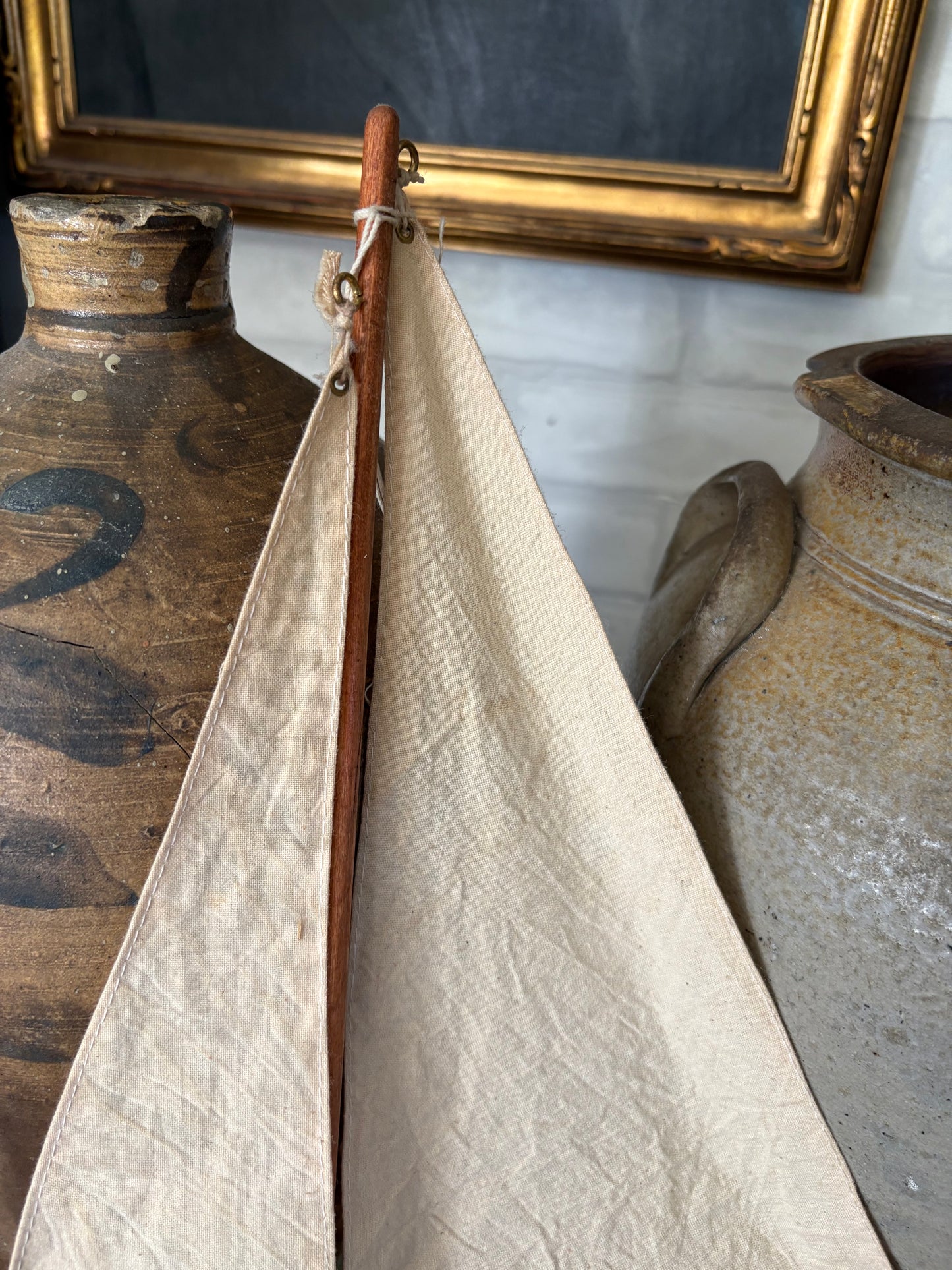 Vintage green wooden sailboat