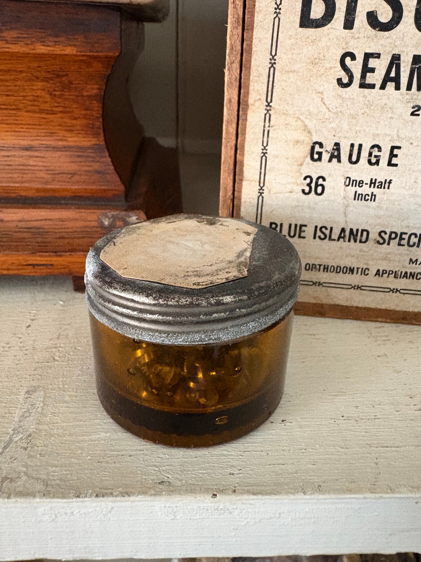 Antique small amber watch maker jar