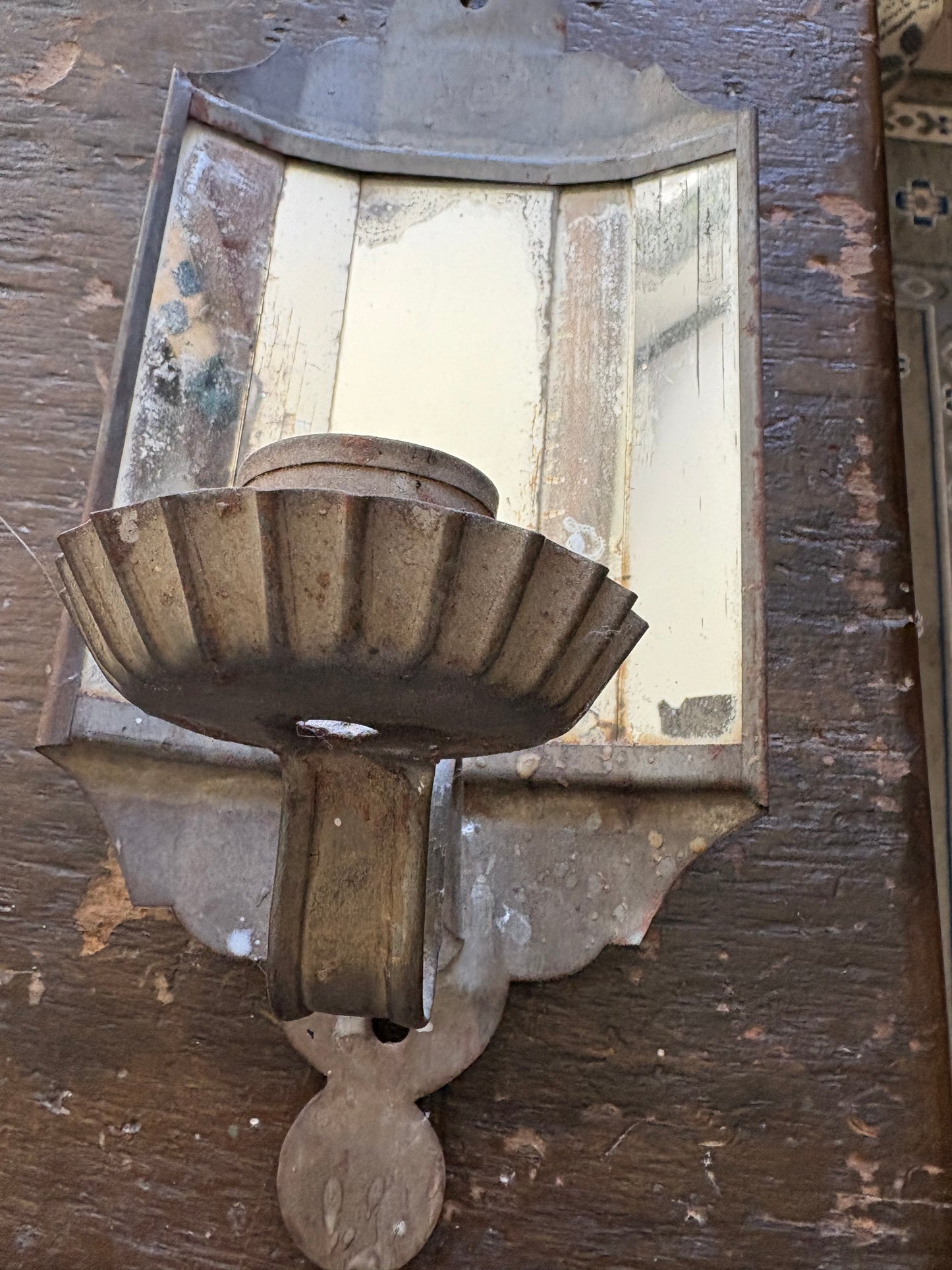 Antique mirrored candle sconce