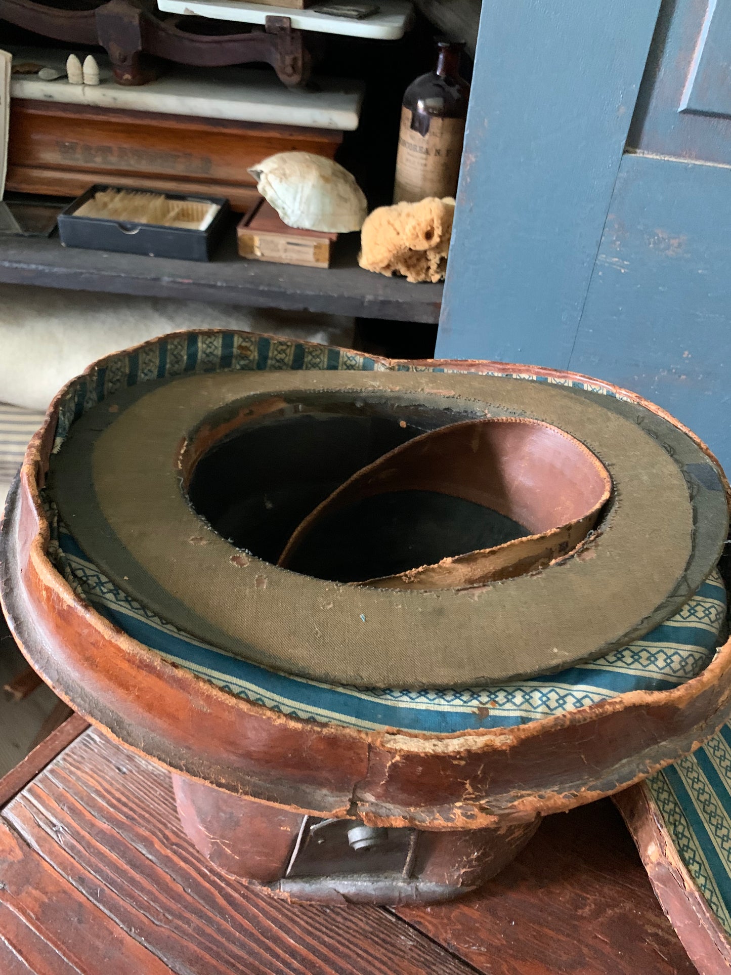 Antique 1800s leather hat box with original hat