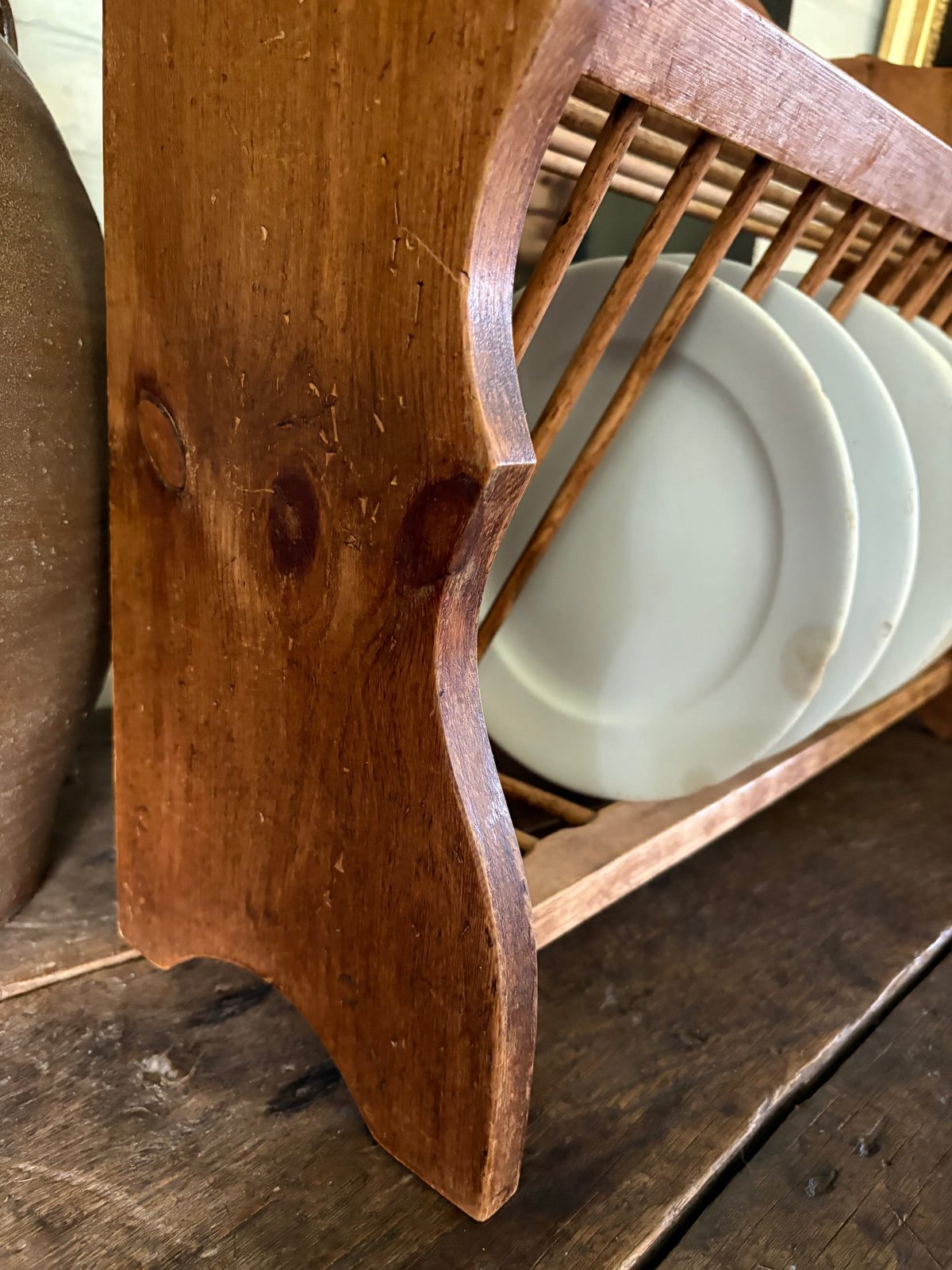 Vintage wooden wall plate rack with scallop detail