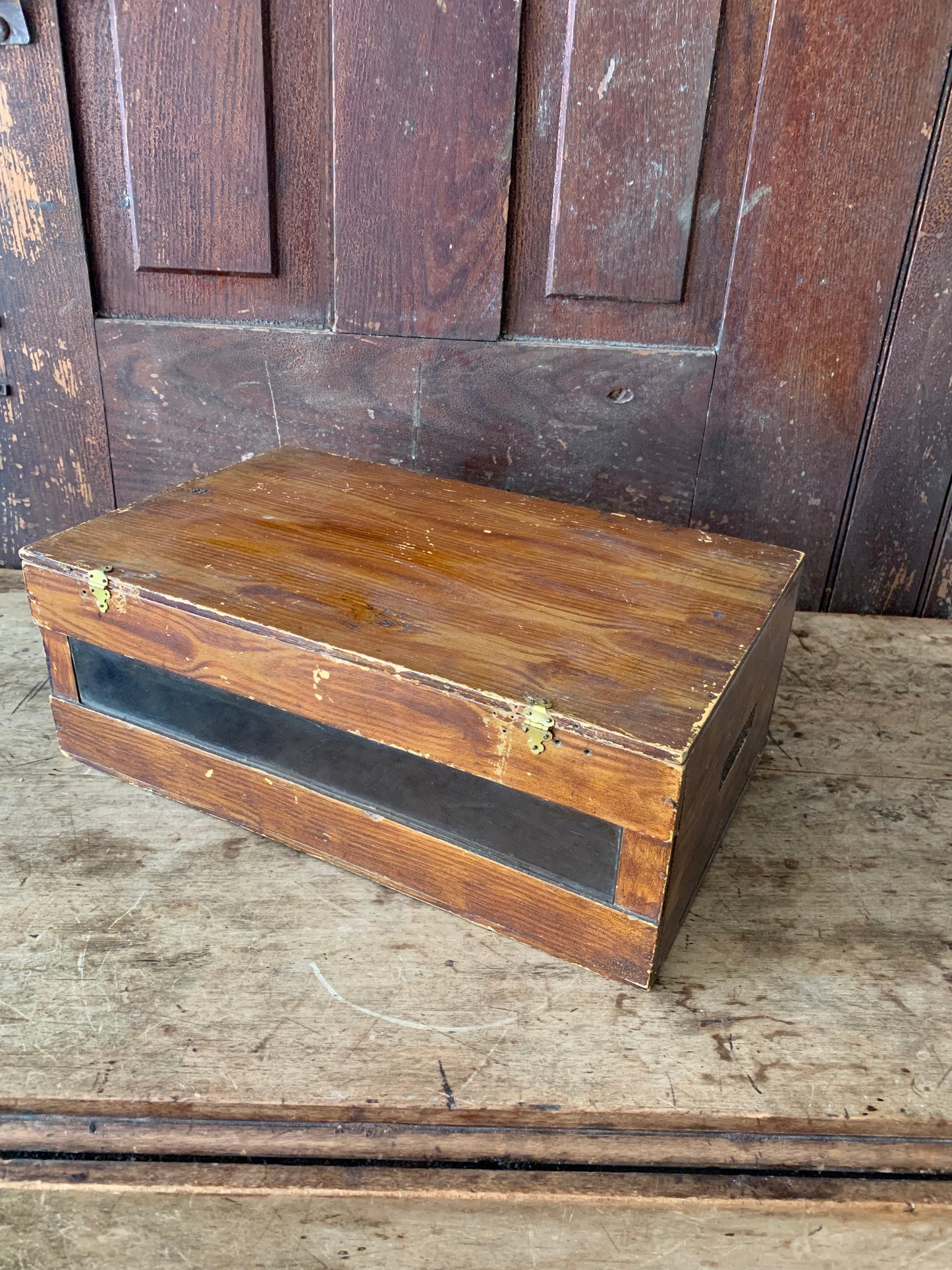 Antique wooden display box with glass front