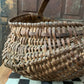 Antique primitive buttocks gathering basket