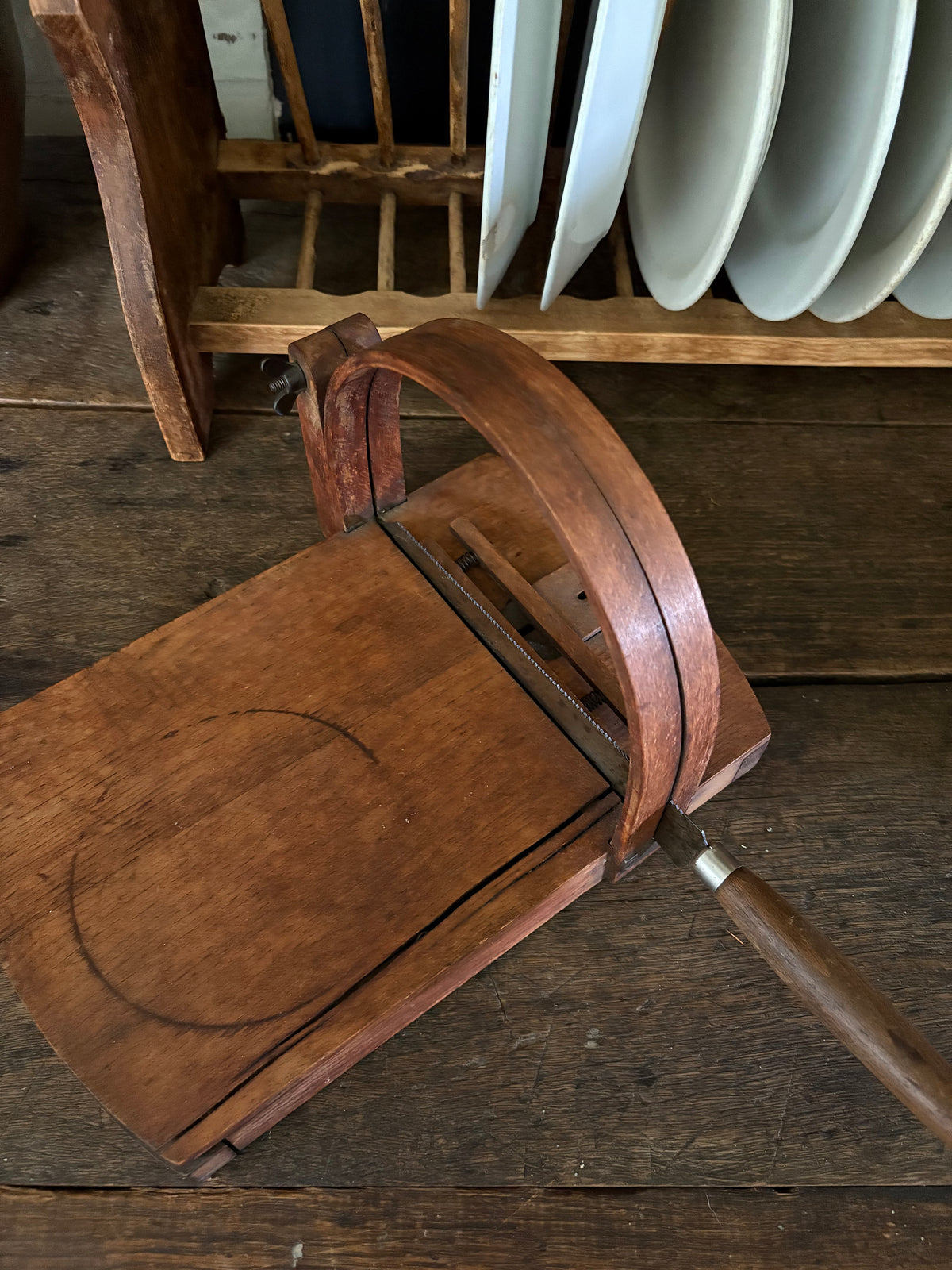 Antique wooden bread slicer with bread knife