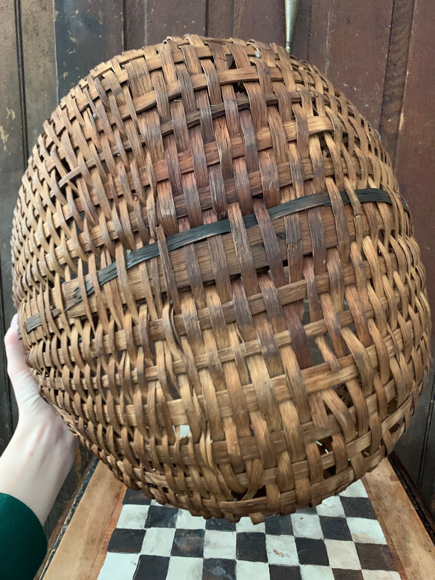 Antique primitive buttocks gathering basket