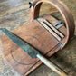 Antique wooden bread slicer with bread knife