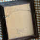 Antique oil painting of woman in frame