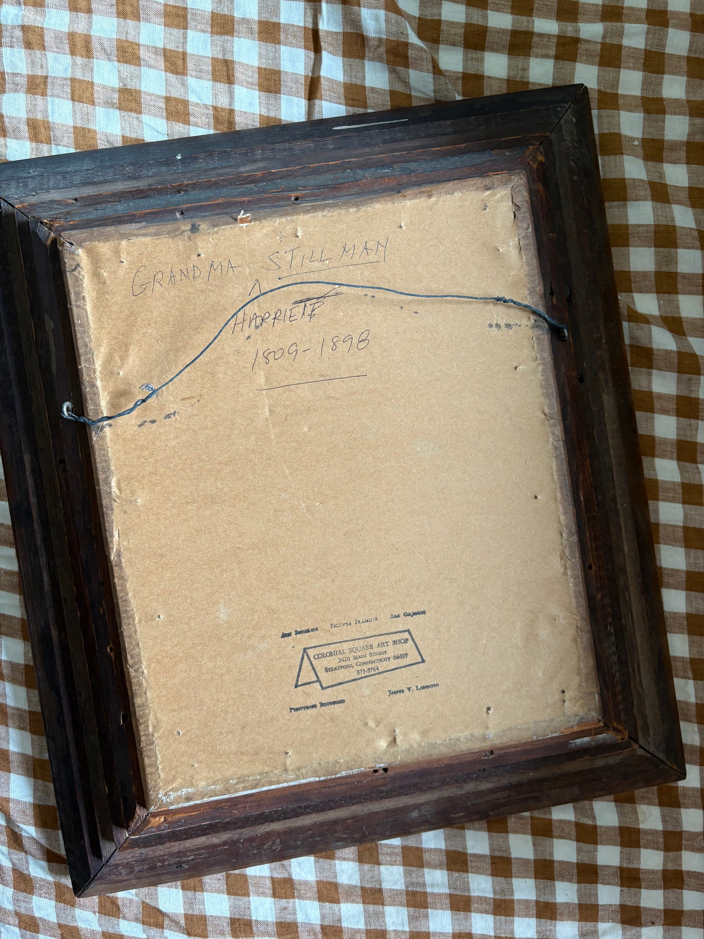 Antique oil painting of woman in frame