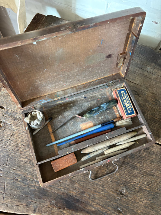 Antique wooden art box with supplies