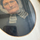 Antique oil painting of woman in frame