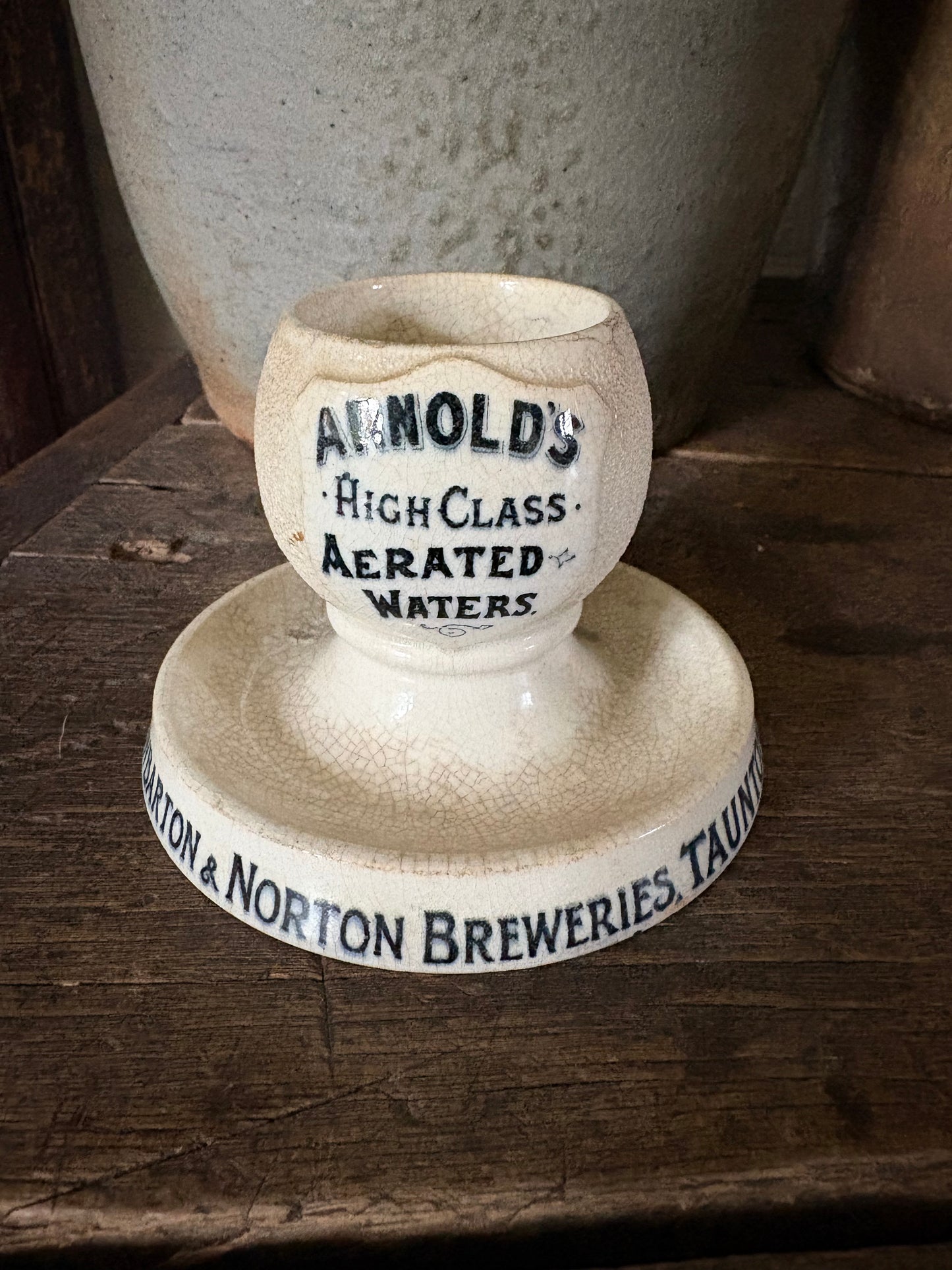 Antique advertising match strike and holder