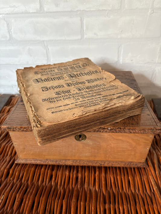 Antique wooden bible box with 1741 German bible