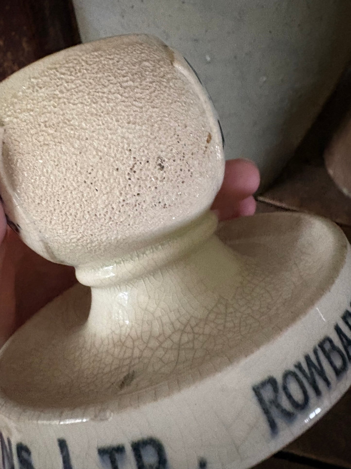 Antique advertising match strike and holder