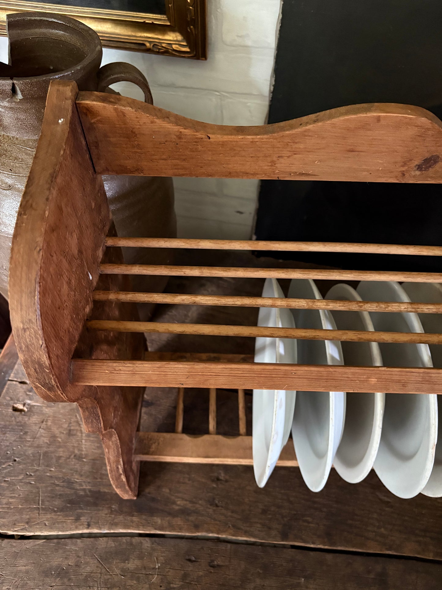 Vintage wooden wall plate rack with scallop detail