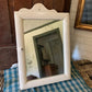 Antique small scalloped mirrored cabinet