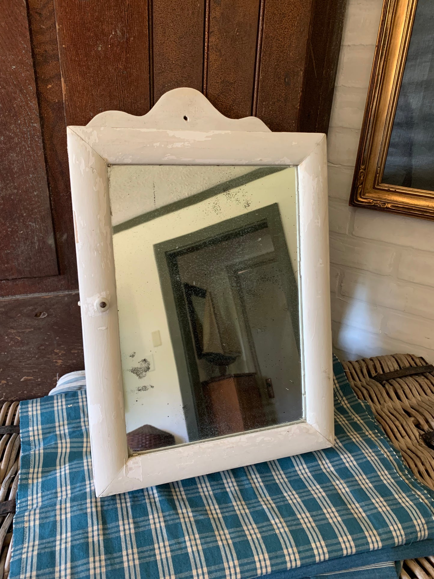 Antique small scalloped mirrored cabinet