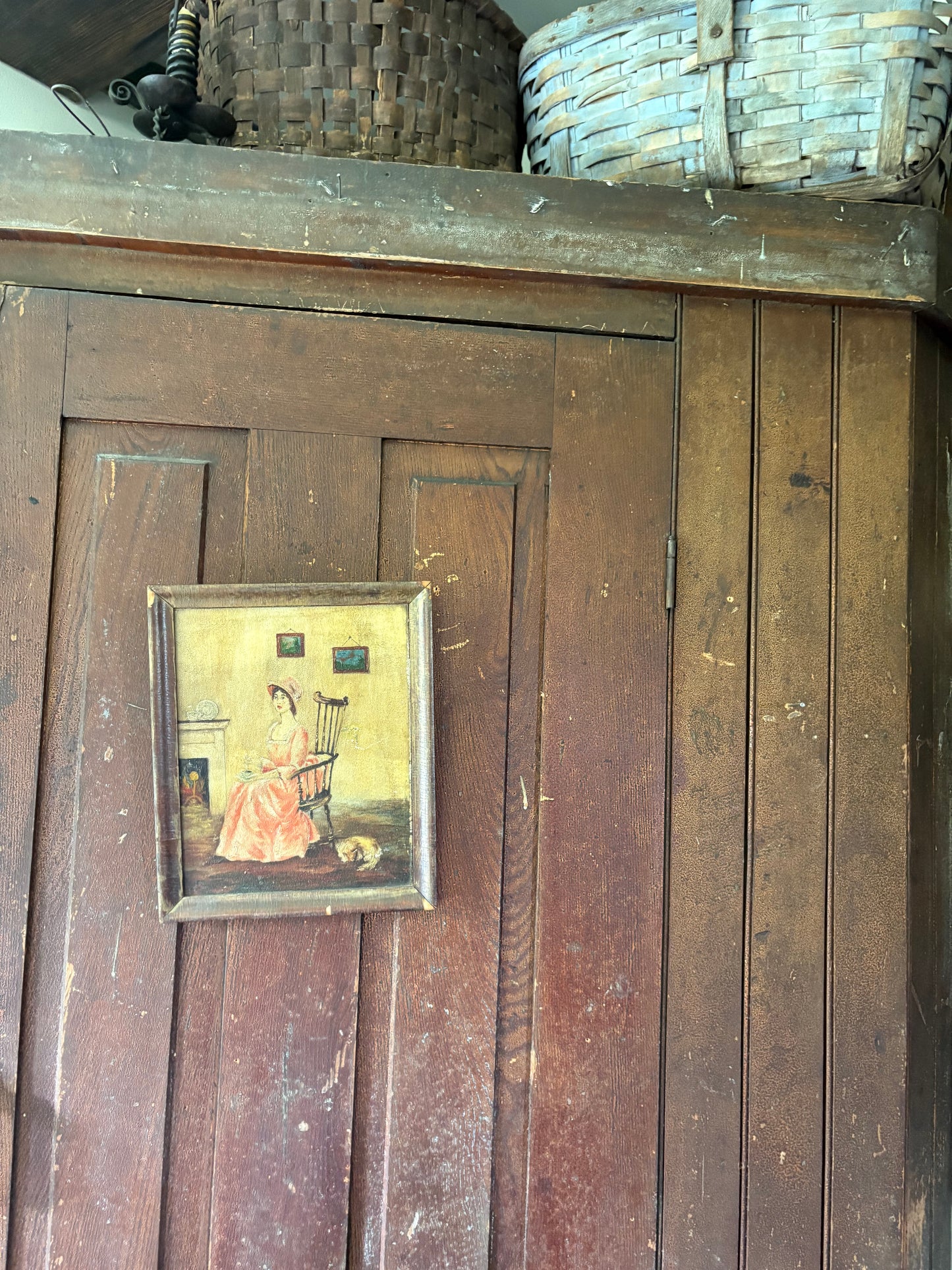 Antique painting of woman in pink dress