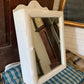 Antique small scalloped mirrored cabinet