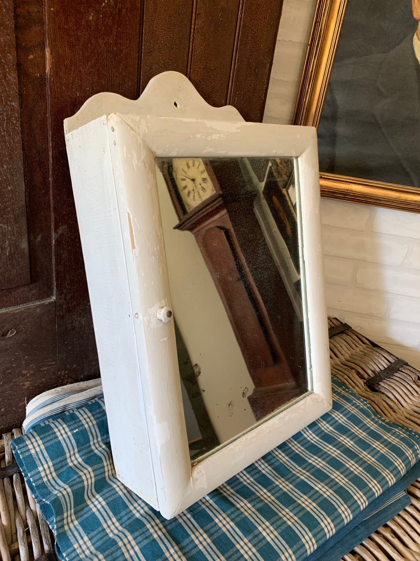 Antique small scalloped mirrored cabinet