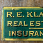 Antique painted glass trade sign| green & gilt