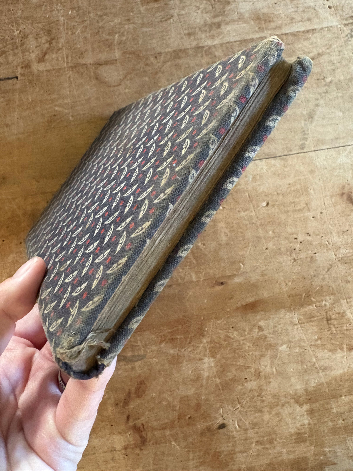 Antique early fabric covered school book