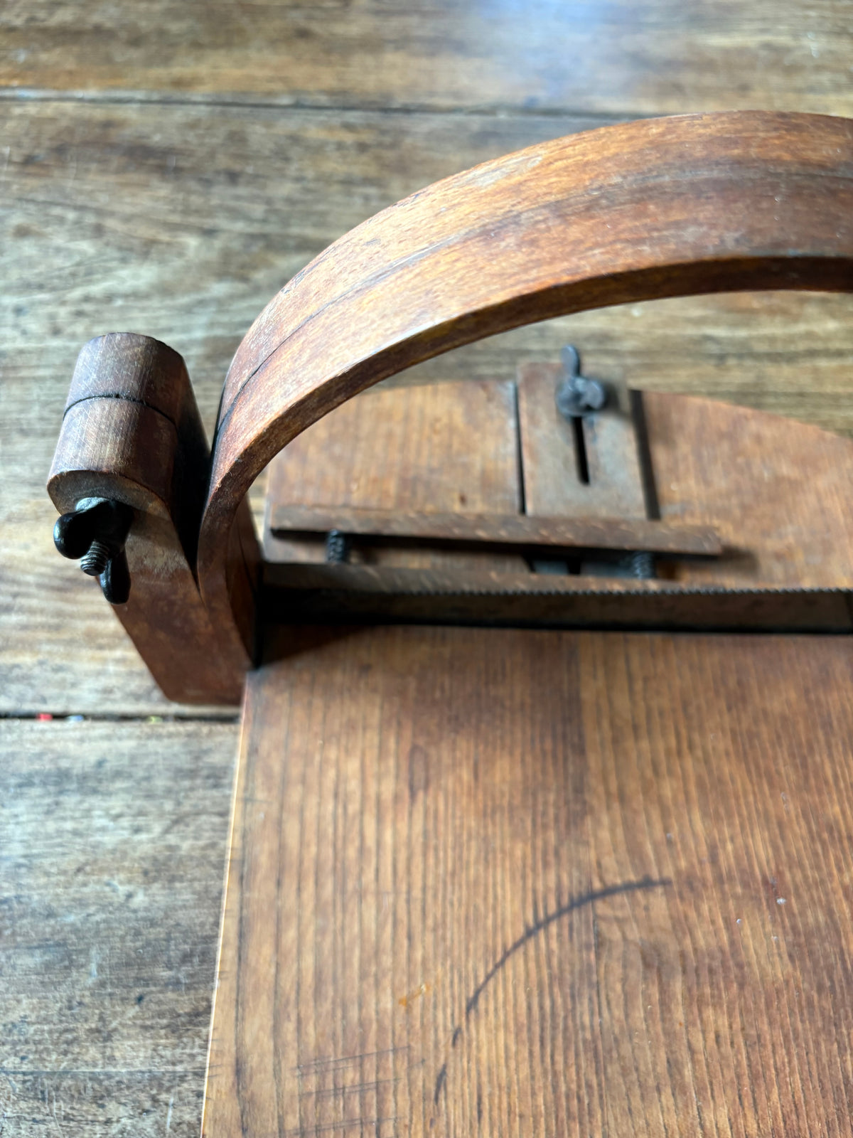 Antique wooden bread slicer with bread knife