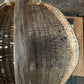 Antique primitive buttocks gathering basket