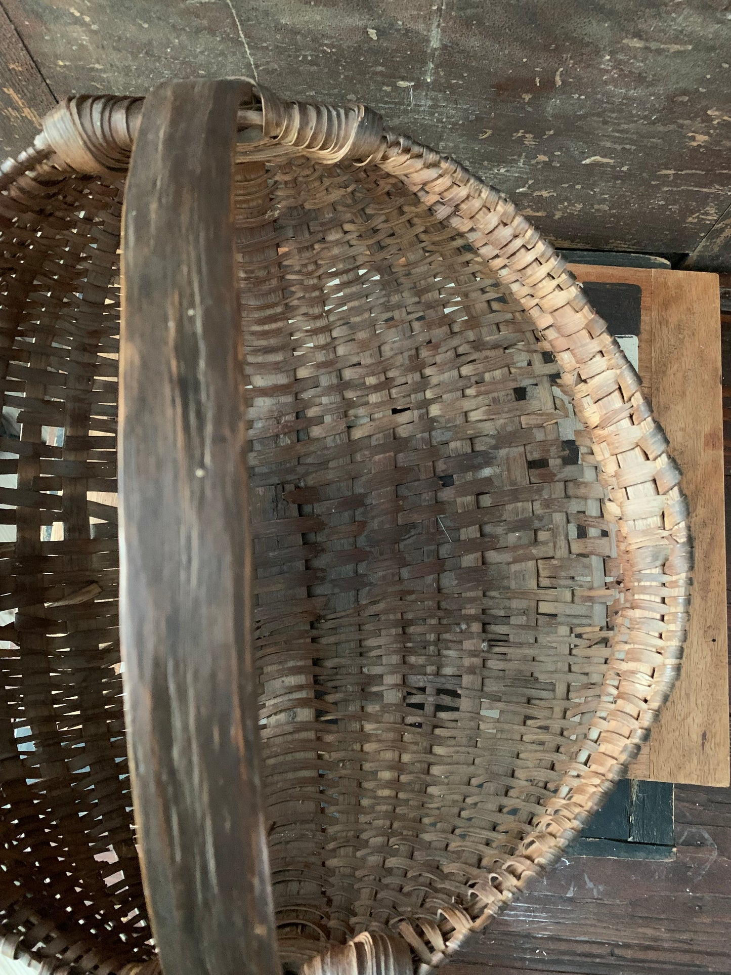 Antique primitive buttocks gathering basket