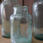 Antique early blue glass jars