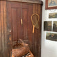 Antique primitive buttocks gathering basket
