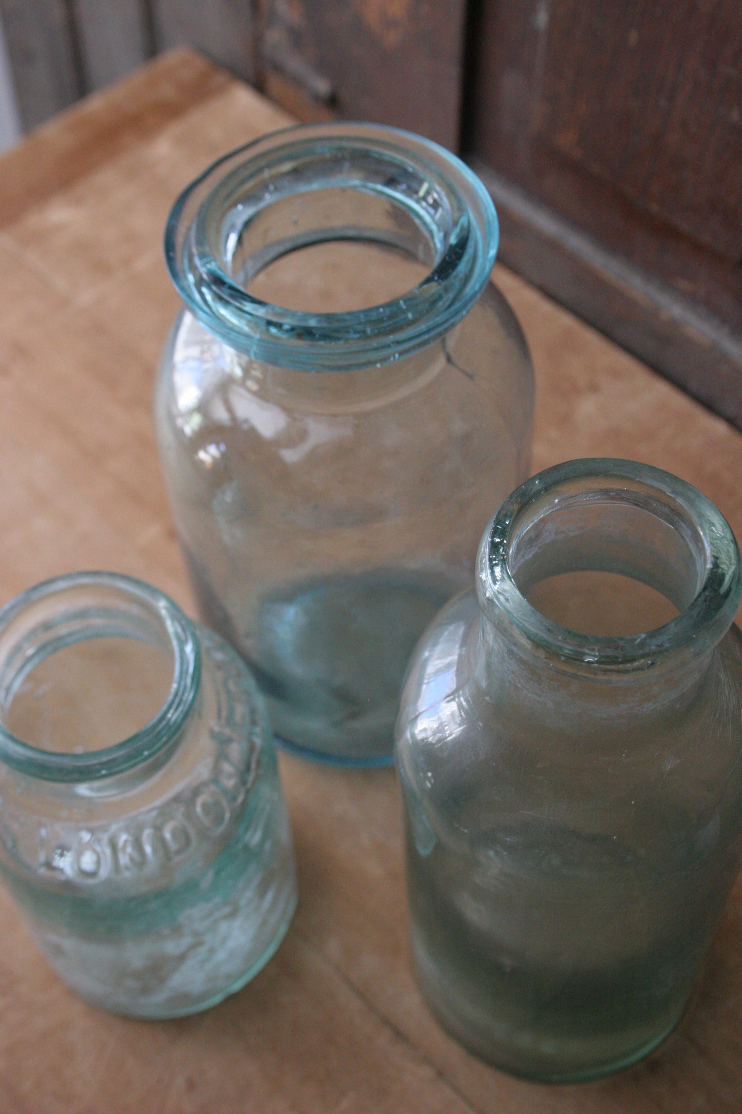 Antique early blue glass jars