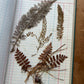 Vintage journal with dried flowers