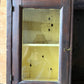 Antique early primitive wall cabinet with scallops