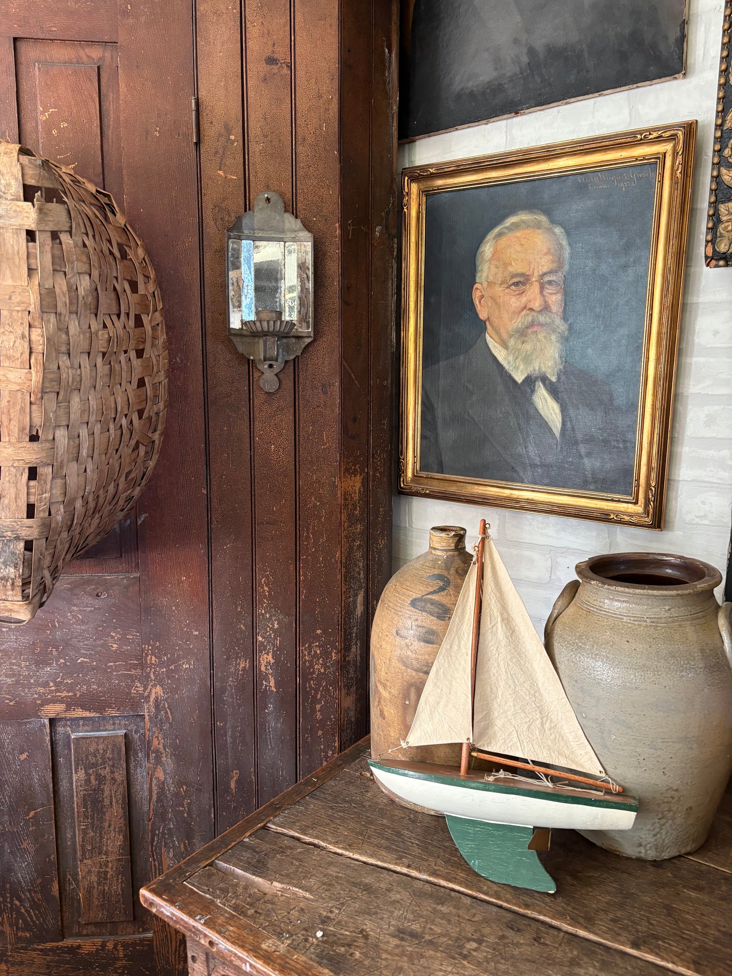 Vintage green wooden sailboat
