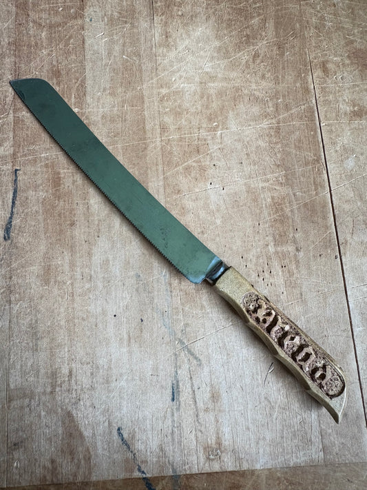 Antique wood carved bread knife