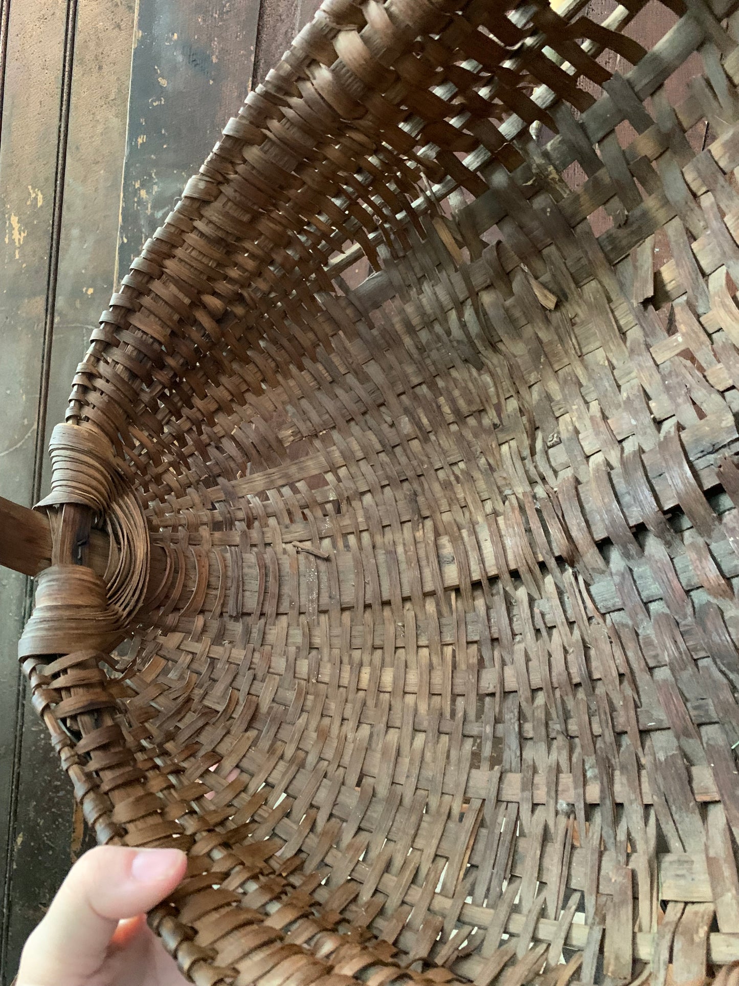 Antique primitive buttocks gathering basket